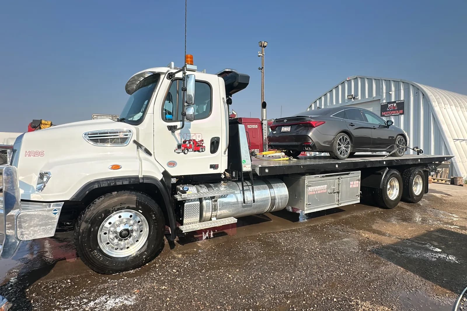 Notorious Towing flat deck in the yard